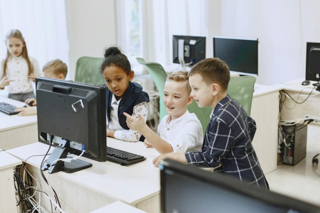 elementary age kids learning in a classroom together